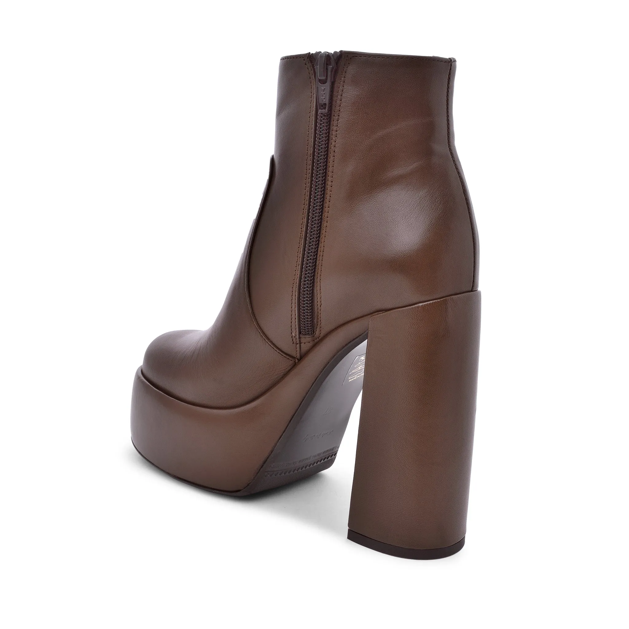 Sato Brown Platform Ankle Boots can be rewritten as Brown Platform Ankle Boots by Sato for improved search engine optimization.