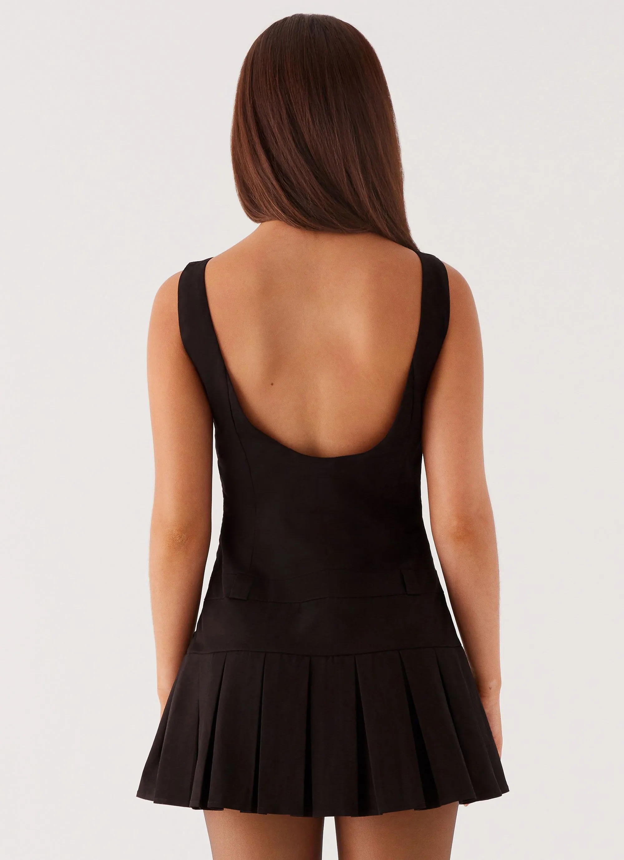 Twilight Pleated Mini Dress in Black by Peppermayo Exclusive