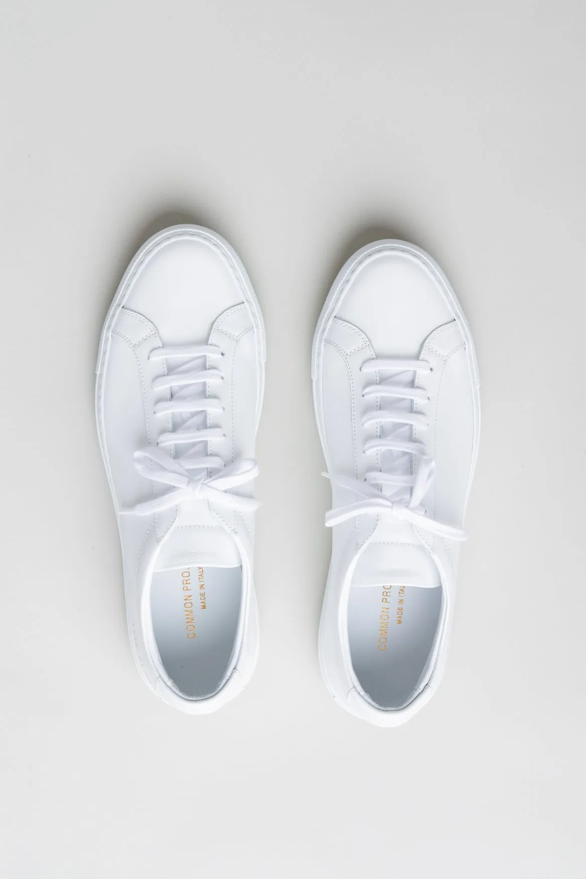 White Leather Low Top Sneakers by Common Projects