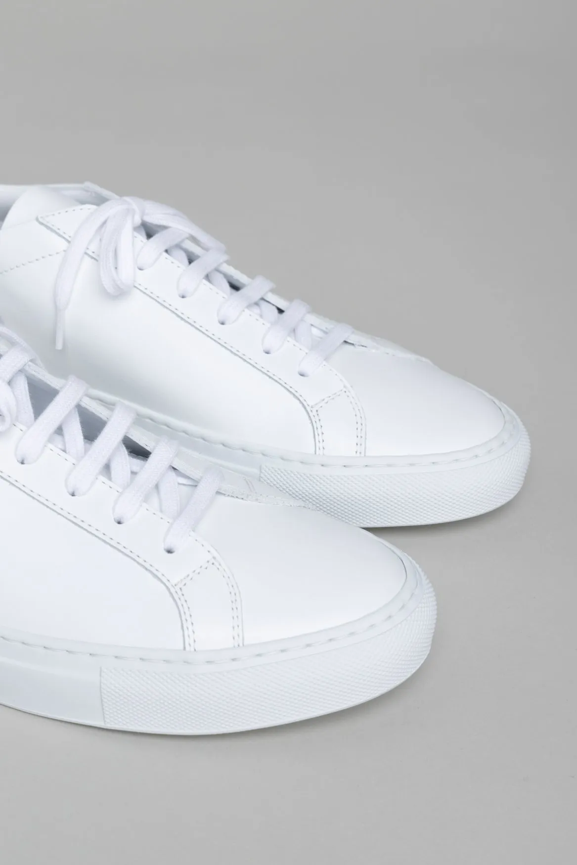 White Leather Low Top Sneakers by Common Projects