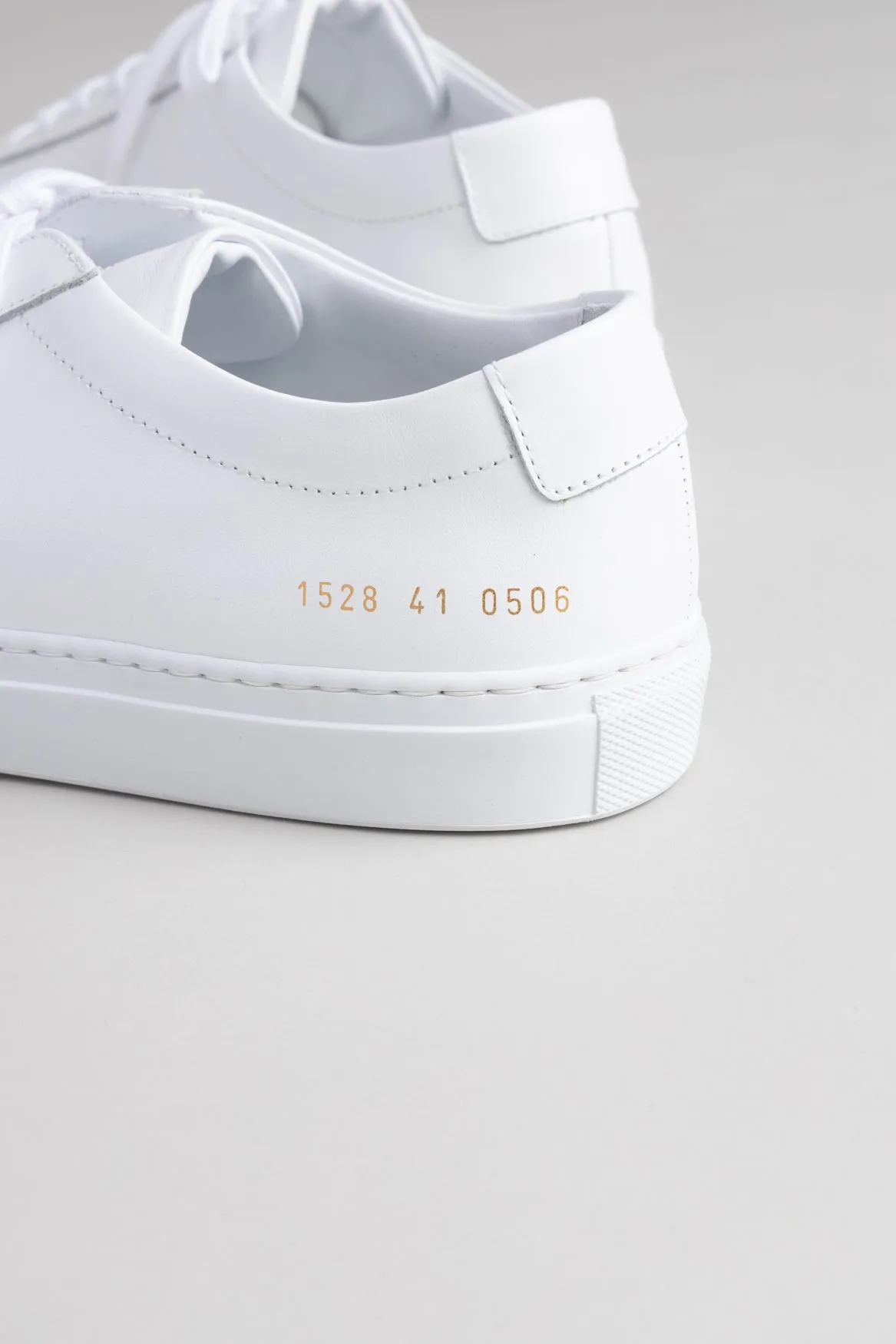 White Leather Low Top Sneakers by Common Projects