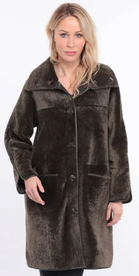 Reversible women's khaki sheepskin coat.