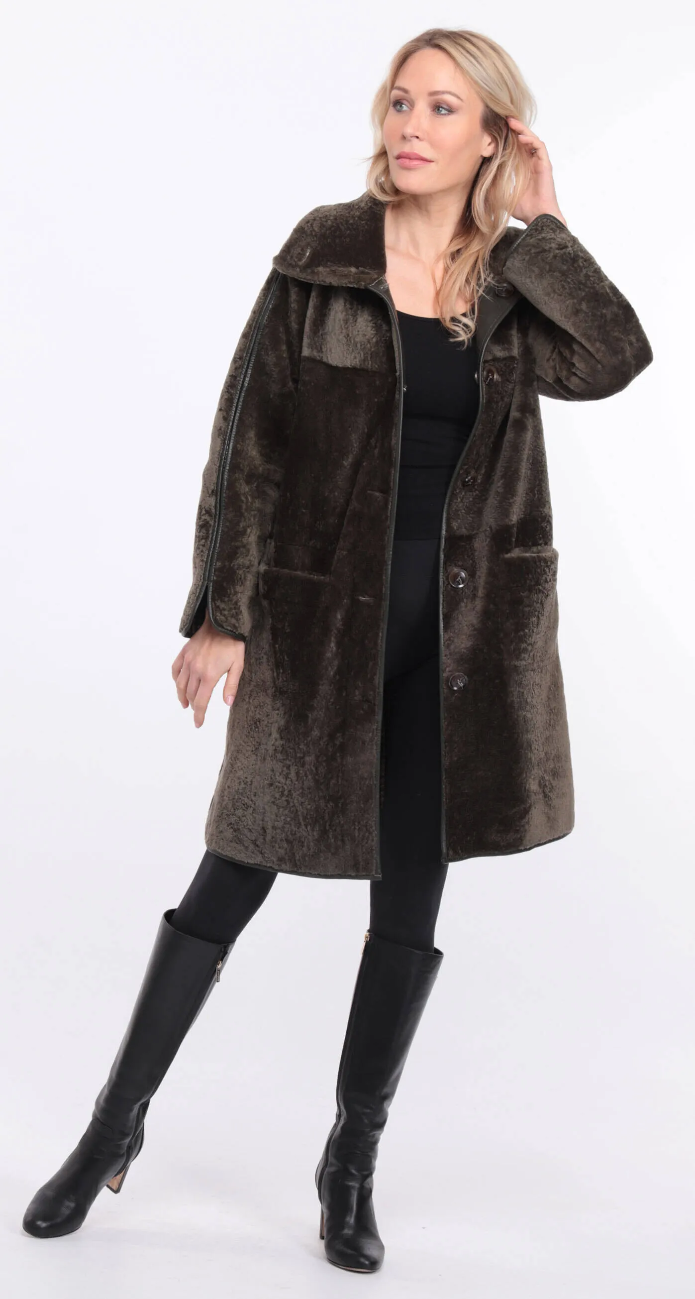 Reversible women's khaki sheepskin coat.